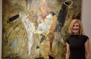 Blonde Woman In Front Of A Painting